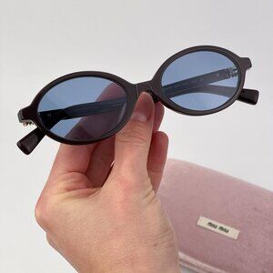 Miu Miu REGARD Women’s Oval Sunglasses – Moka Blue Model MU04ZS 22C60C AUTHENTIC